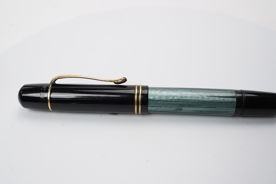 A Pelikan 100N fountain pen fitted with a 14ct. gold Pelikan nib